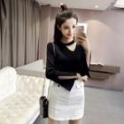 Embellished Cutout Knit Top