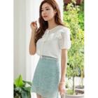 Tie-neck Lace-yoke Ruffled Top
