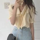Ruffle-hem Short-sleeve Blouse Light Yellow - One Size