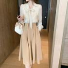 Tie-neck Blouse / High Waist A-line Midi Skirt