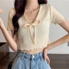 Short-sleeve Lettuce Edge Bow-front Knit Top