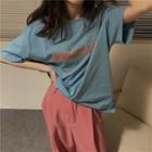 Short-sleeve Lettering Print T-shirt / Wide Leg Pants