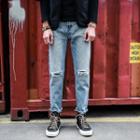 Distressed Denim Slim Jeans