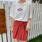 Short-sleeve Lettering T-shirt / Mini Wrap Skirt
