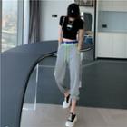 Short-sleeve Lettering Cropped T-shirt / Lettering Waistband Sweatpants