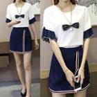 Set: Two-tone Short-sleeve Chiffon Top + Contrast Trim A-line Skirt