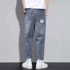 Lettering Washed Tapered Jeans
