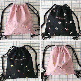 Embroidered Drawstring Canvas Backpack