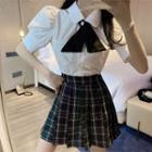 Short-sleeve Bow Tie Shirt / Plaid Pleated Skirt