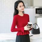 Ruffle Hem Cable Knit Sweater