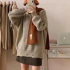 Loose-fit Ripped Knit Sweater