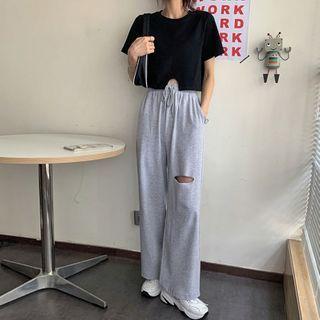 Cropped T-shirt / Distressed Pants