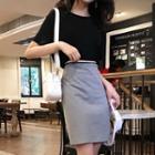 Cutout Back Short-sleeve T-shirt / High Waist A-line Skirt
