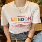 Short-sleeve Lettering Print T-shirt / Lettering Embroidered Pleated Mini A-line Skirt