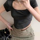 Short-sleeve Asymmetrical Cropped T-shirt / Mini Pencil Skirt