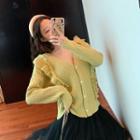 Long-sleeve Ruffled Buttoned Knit Top