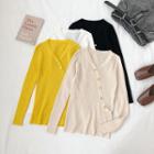 Diagonal Buttoned V-neck Knit Top