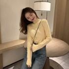 Long-sleeve Mock Neck Button Accent Top