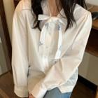 Ribbon Tie-neck Embroidered Blouse