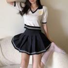 Short-sleeve Badge Embroidered Polo Shirt / A-line Skirt