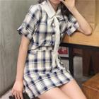 Bow-accent Plaid Short-sleeve Blouse / Slim-fit Skirt