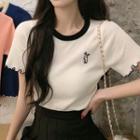 Rabbit-embroidered Contrast-trim Short-sleeve Knit Top