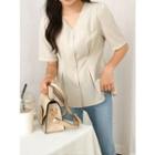 Puff-shoulder Peplum Blouse