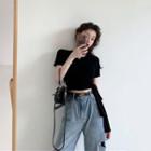Short-sleeve V-neck Top / Ripped Wide Leg Jeans