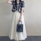 Short-sleeve Pattern Jacket / Midi A-line Skirt