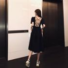 Plain Short-sleeve Open-back A-line Dress