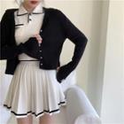 Plain Cardigan / Short-sleeve Knit Polo Shirt / Mini A-line Pleated Skirt