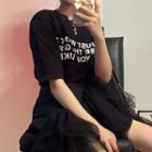 Elbow-sleeve Lettering T-shirt / Asymmetrical Mesh A-line Skirt
