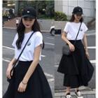 Flower T Shirt + Wide High-waist Asymmetrical Maxi Skirt