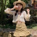 Long-sleeve Tie-strap Crop Lace Top / Asymmetrical Waist Ruffle Hem Mini Skirt