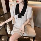 Set: Short-sleeve Two-tone Cropped Blouse + Mini A-line Skirt