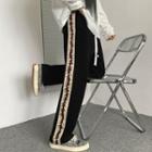 Elastic-waist Thorns Embroidered Contrast Trim Pants