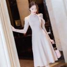 Cutout-shoulder Long Sleeve Knitted A-line Dress