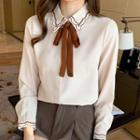 Long-sleeve Embroidered Tie-neck Chiffon Blouse