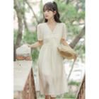 Short-sleeve V-neck Frog-button Midi A-line Dress