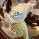 Short-sleeve Letter Print T-shirt / High-waist Floral Skirt