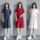 Set: Plain Short Sleeve Henley T-shirt + A-line Skirt