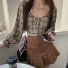 Puff-sleeve Plaid Lace-up Blouse / High-waist A-line Mini Skirt