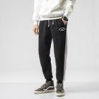 Embroidered Fleece-lined Sweatpants