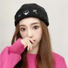 Embroidered Distressed Knit Cap