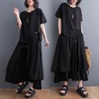 Set: Short-sleeve Asymmetrical T-shirt + Midi A-line Skirt