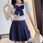 Set: Short-sleeve Bow Blouse + Pleated A-line Skirt