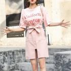 Set: Lettering Elbow-sleeve T-shirt + Bow Accent High-waist Straight-fit Skirt