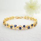 Fashion And Elegant Plated Gold Rippled Blue Cubic Zirconia Bracelet Golden - One Size