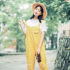 Distressed Pinafore Jumpsuit
