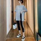 Slit Short-sleeve T-shirt / Crop Striped Pants